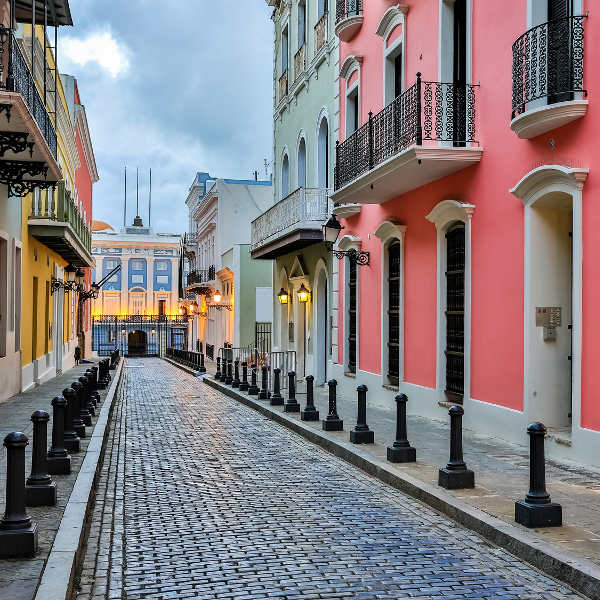 cobbled street pink house